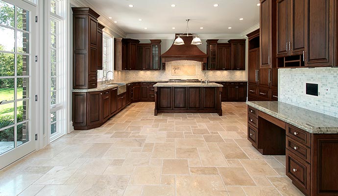 Kitchen featuring a clean and polished travertine floor Kitchen featuring a clean and polished travertine floor
